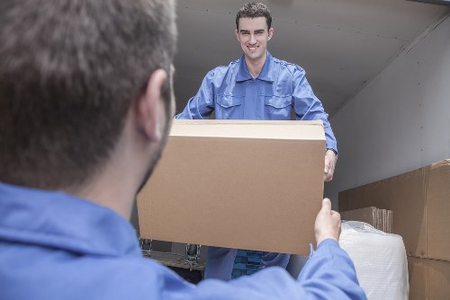 Removal van and moving boxes prepared for a Pimlico home move
