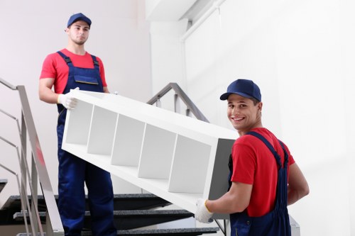 Local moving team loading furniture for a Pimlico flat or office