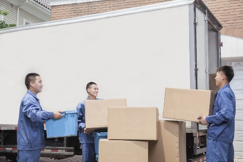 Office and home items being moved by a Pimlico van team