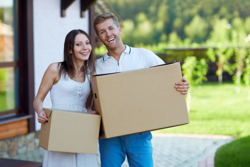 Packed boxes and furniture prepared for a domestic move in central London