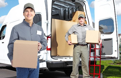 Professional loading of furniture into a removal van in central London