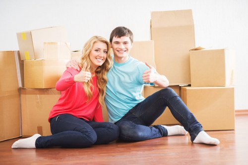 Local moving team handling boxes and furniture for a Pimlico relocation