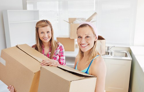 Packed boxes and furniture ready for professional house removals in Pimlico