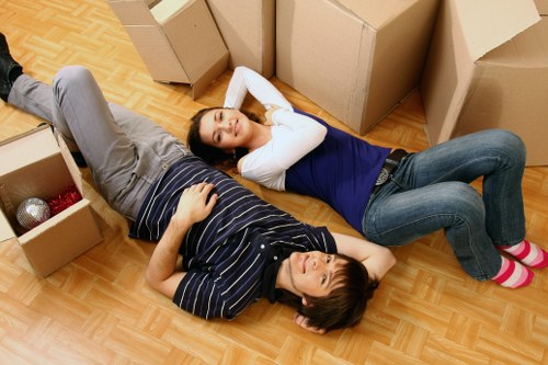 Moving team handling household items with care