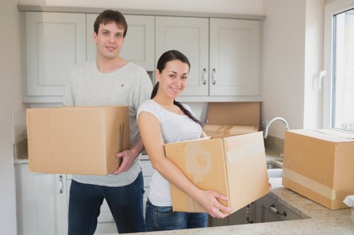 Van transport service near Pimlico with boxes and household items